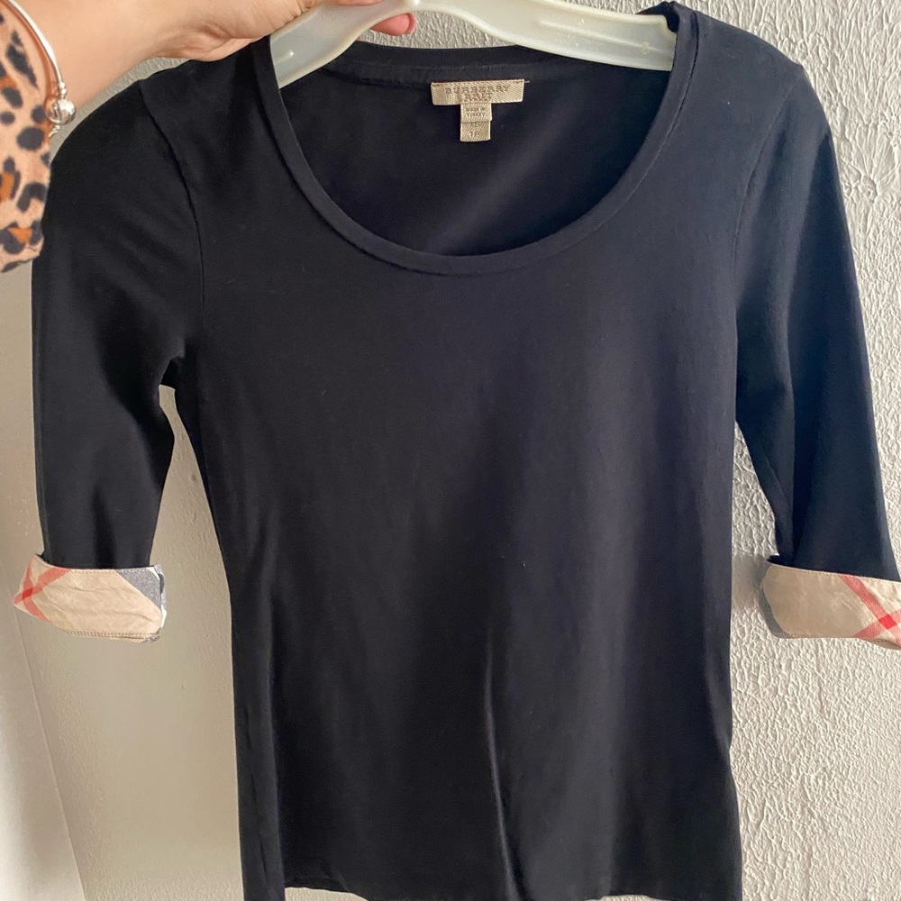 Black burberry top. Only worn twice